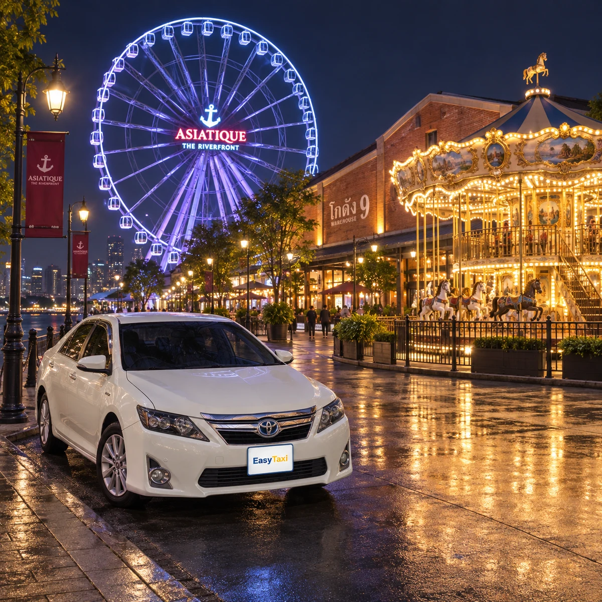 ライトアップされた観覧車とメリーゴーラウンドのあるアジアティーク・ザ・リバーフロントに停まる白いEasyTaxiの車